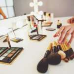 Beautiful girl doing makeup