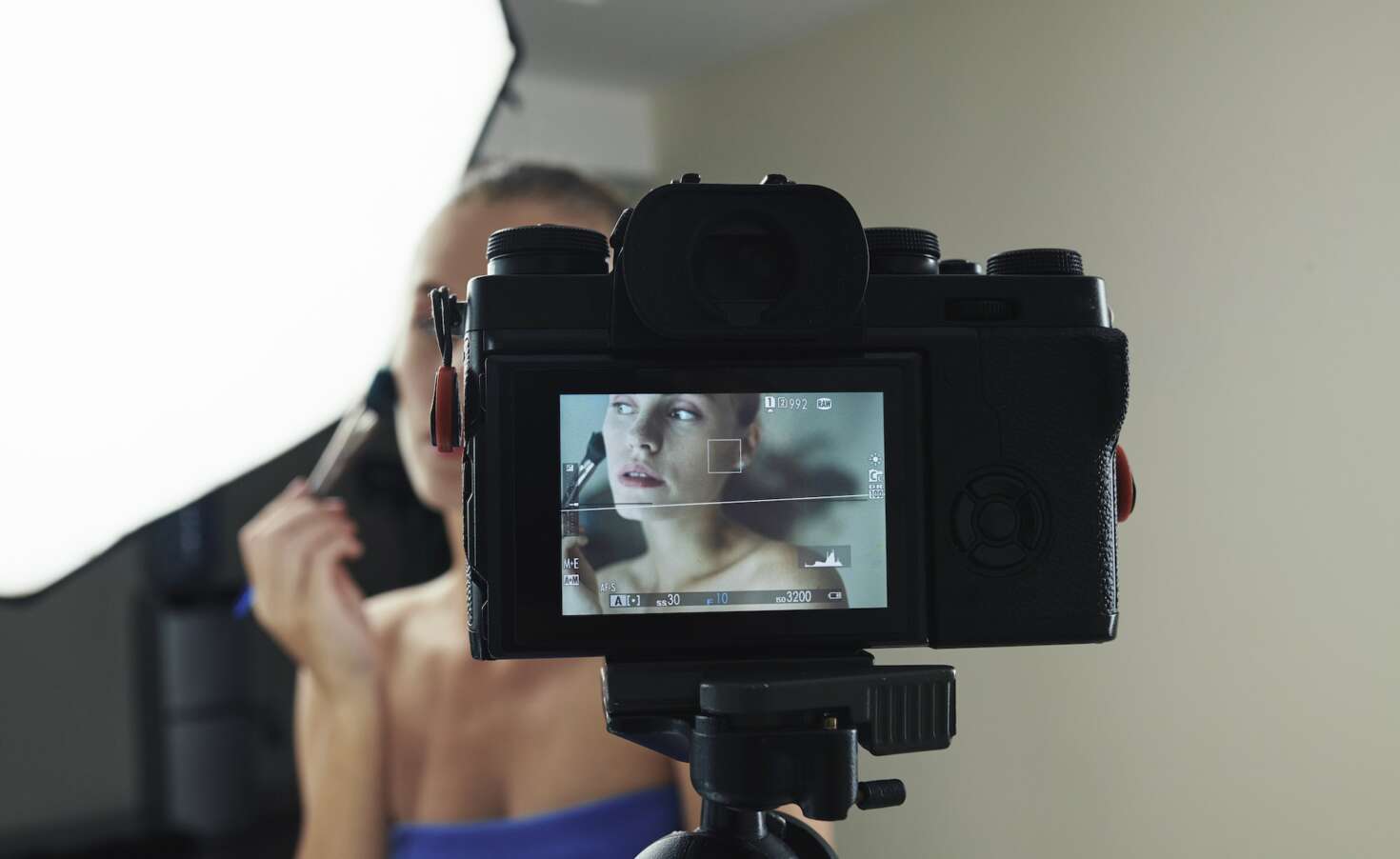 Beauty blogger shooting make-up video