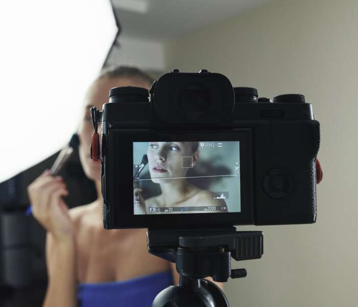 Beauty blogger shooting make-up video