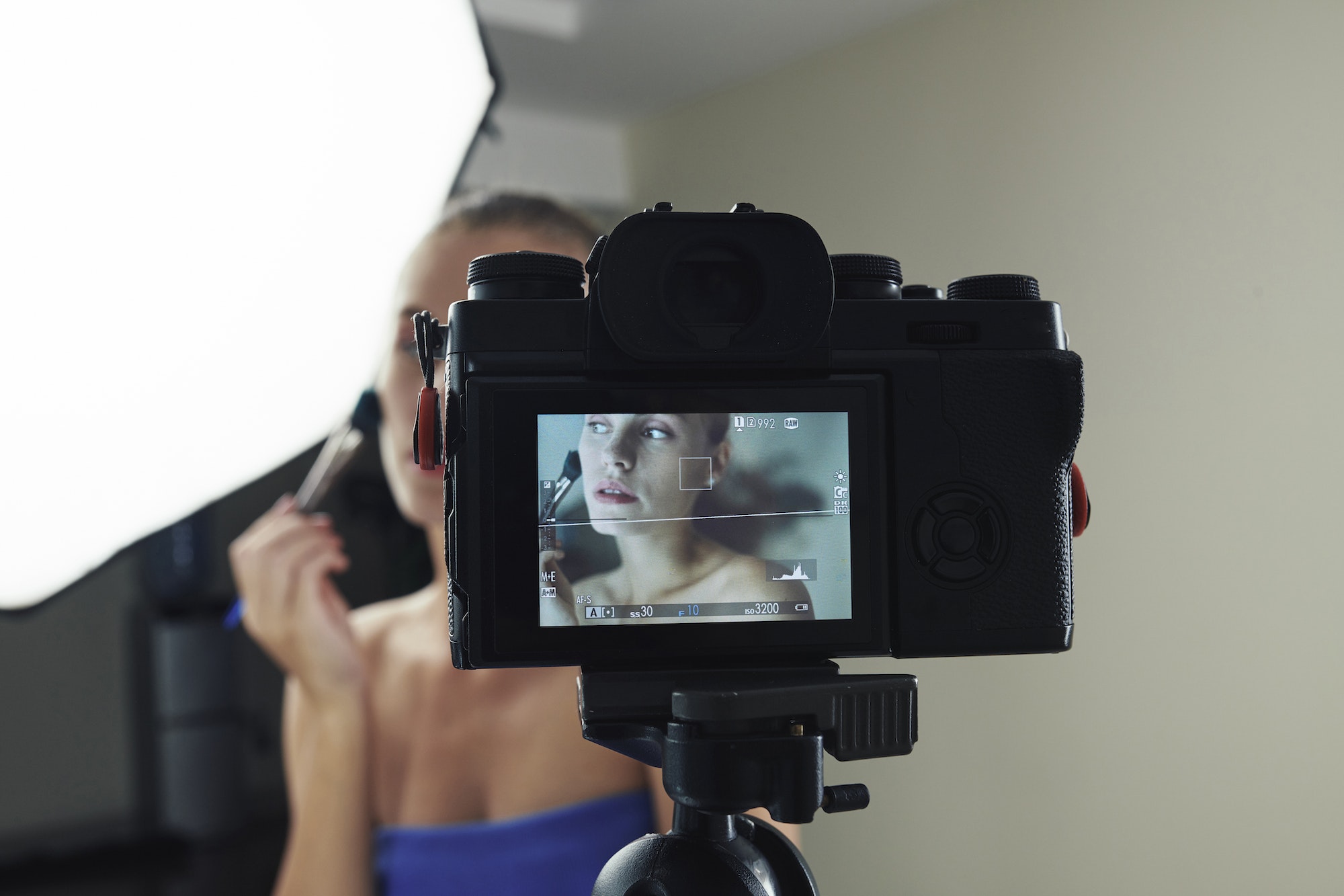 Beauty blogger shooting make-up video