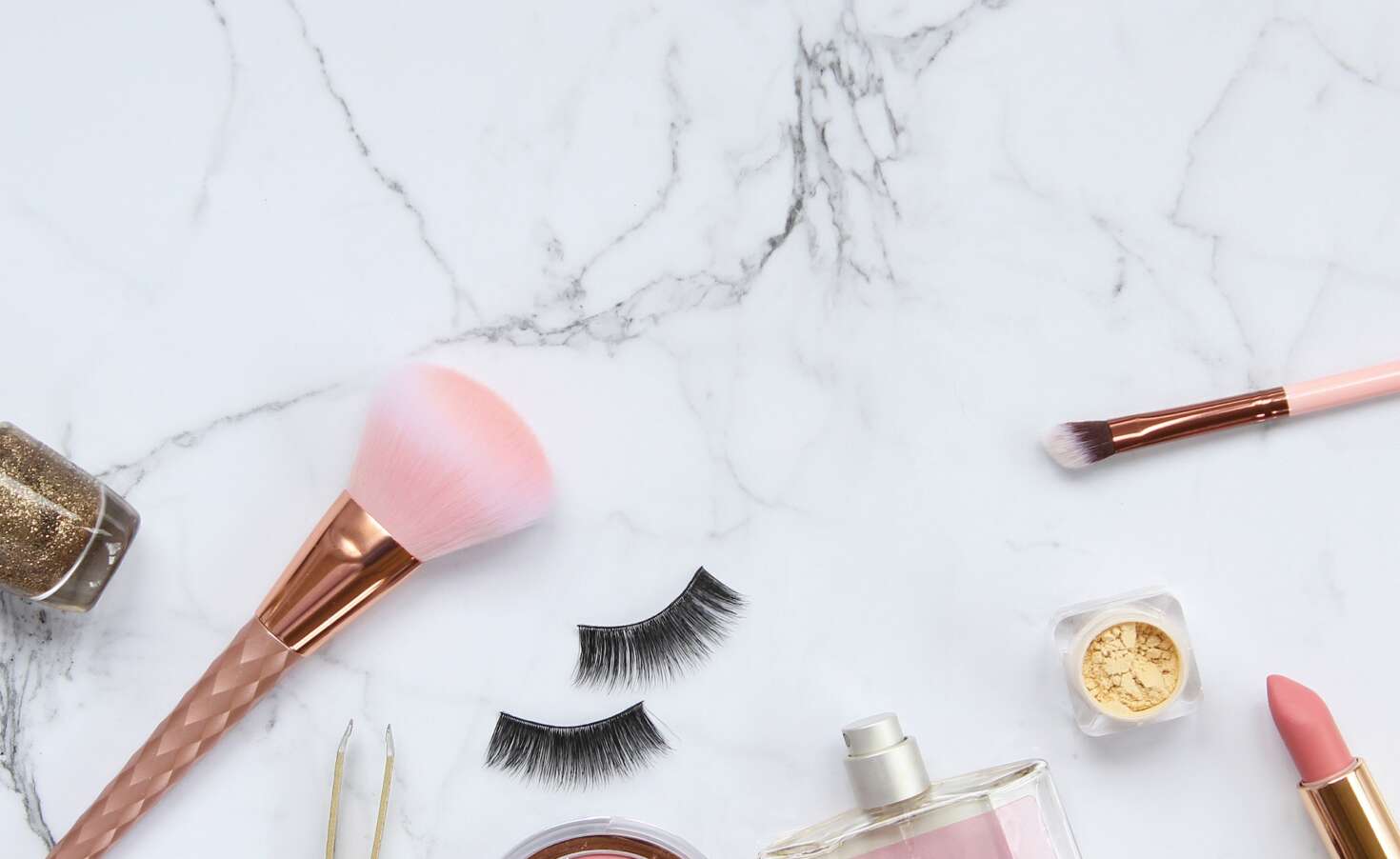 Beauty makeup objects on marble background