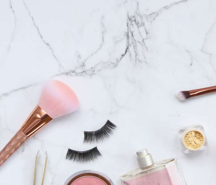 Beauty makeup objects on marble background