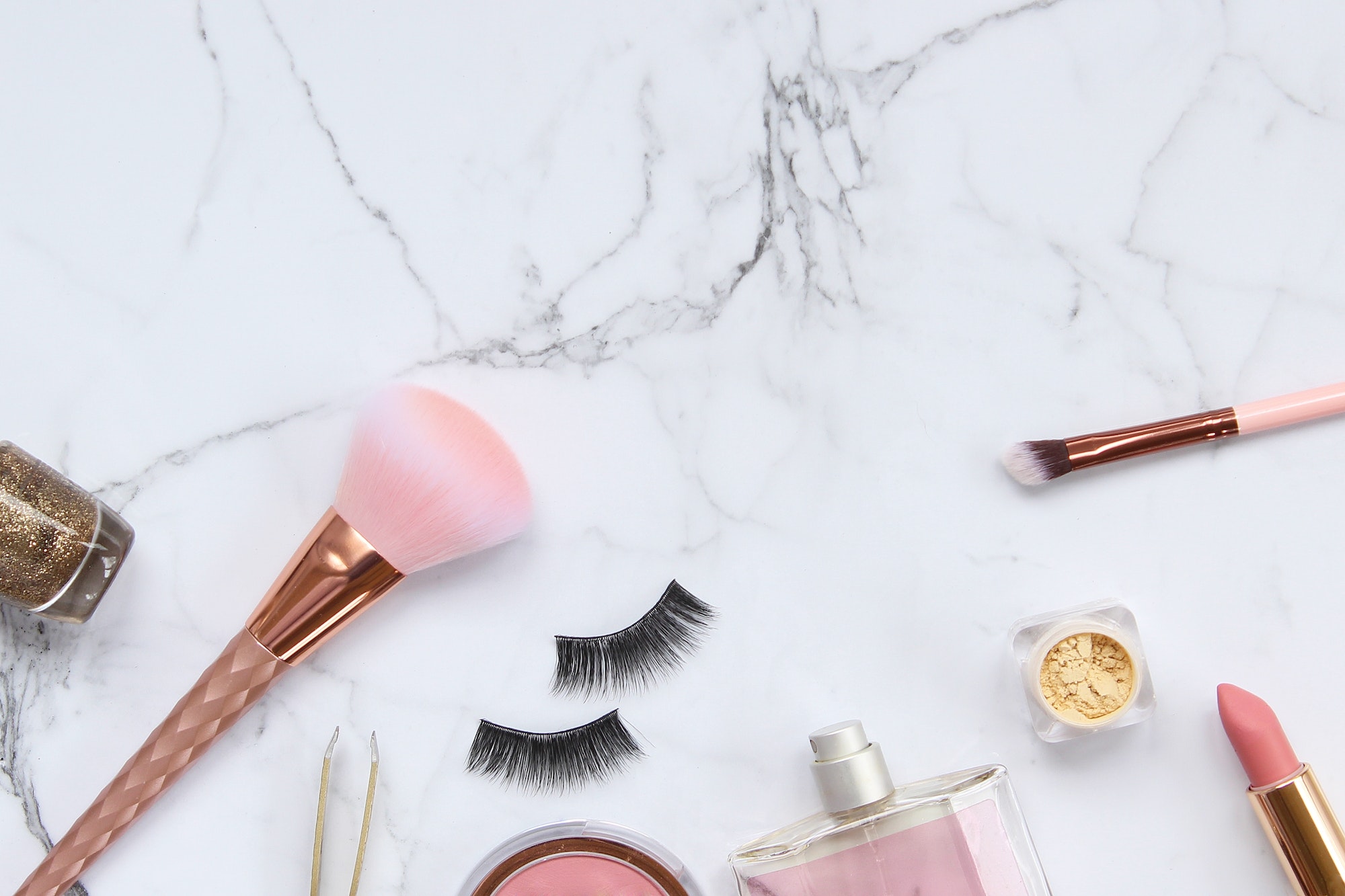 Beauty makeup objects on marble background
