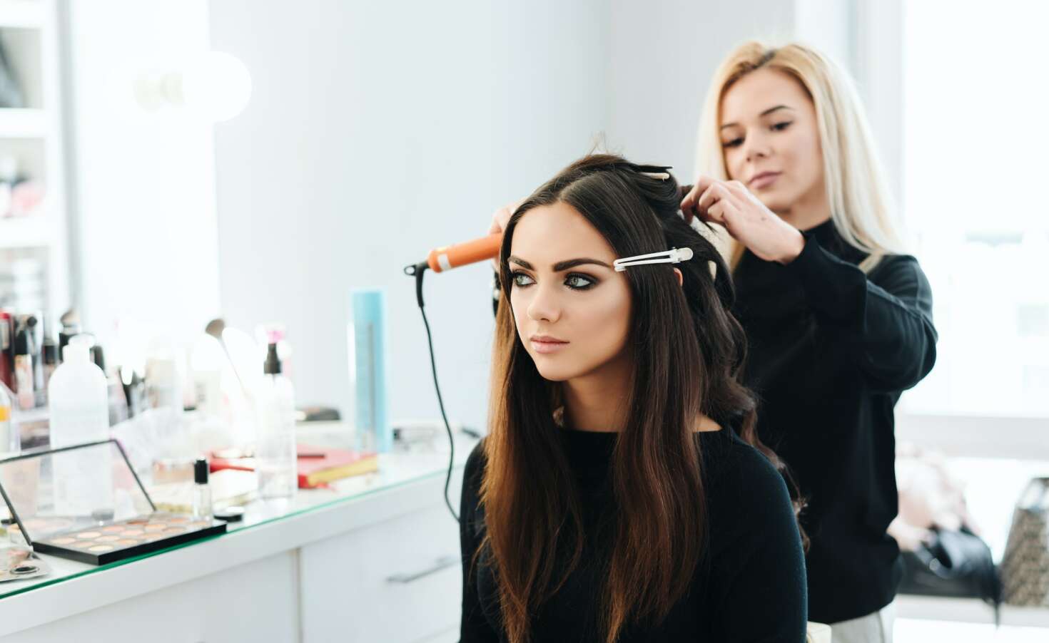 Makeup and hairstyle for a beautiful model