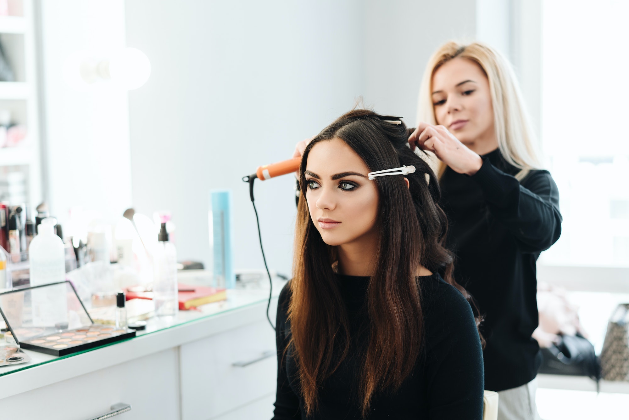 Makeup and hairstyle for a beautiful model