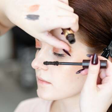 Professional make-up master class. Young beautiful model, make up in process